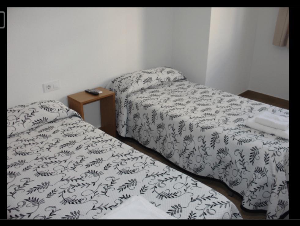 Habitacions Casa Roberto ออนตินเยนต์ ภายนอก รูปภาพ